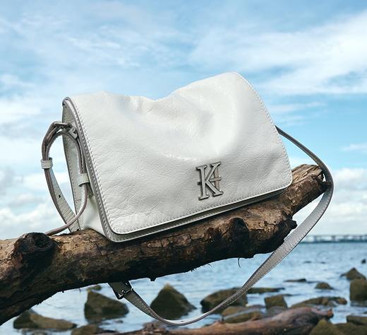 明治女包包女式2025新款斜挎包大容量真皮慵懒风包高级感翻盖包 商品图0