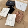 点此购买 普拉达春夏季三角扣女款短袖POLO衫 gz 309719 商品缩略图10