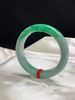 612250，55.3圈口，飘绿正圈平安镯，淡底色飘一截阳绿色，色浓，底子细腻，内圈有个矿点 商品缩略图2