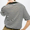中性风黑白条纹棉麻短袖T恤 高舒适麻棉条纹上衣 ​有一定厚度 透气不闷 柔棉与汉麻混纺的新型面料 宽松直筒版型 这肉显瘦 经典条纹微落肩设计 简约复古 商品缩略图1