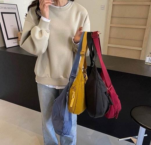 【任选2件99元】（男女同款，轻巧能装）Jacoponnus情侣简约风饺子包 商品图2