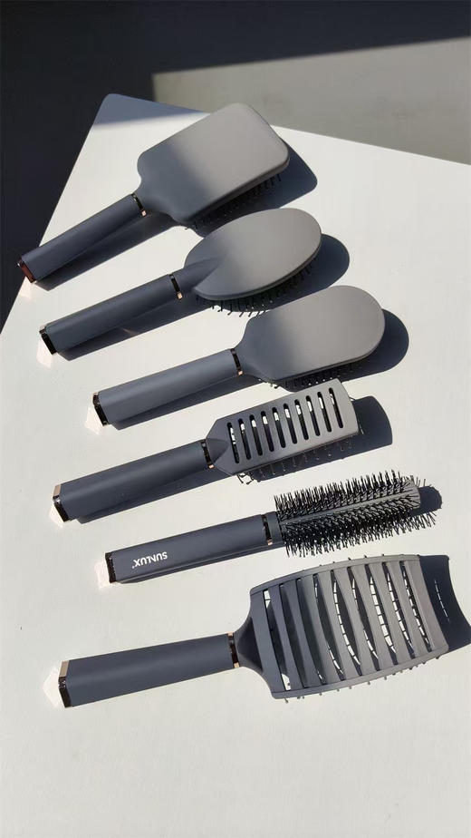 SUNLUX原单正品6件套灰色质感气囊梳空气梳套装
官网单件售价8.94美金，6件套53美金，合计人民币384元 商品图7