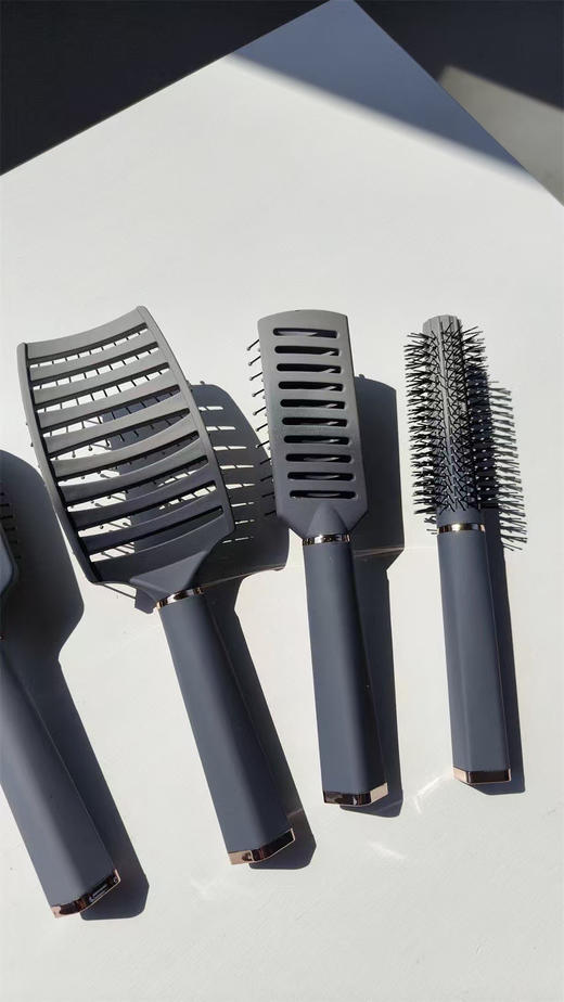 SUNLUX原单正品6件套灰色质感气囊梳空气梳套装
官网单件售价8.94美金，6件套53美金，合计人民币384元 商品图9