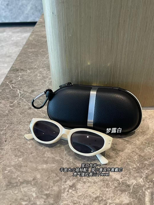 外贸订单GM 同款猫眼太阳镜。先说重量：「29.7g空气感」比手机还轻的重量！！！佩戴一整天也不会有不适感
但是它的质地感是真的“沉甸甸”一眼贵～
四个色 商品图2