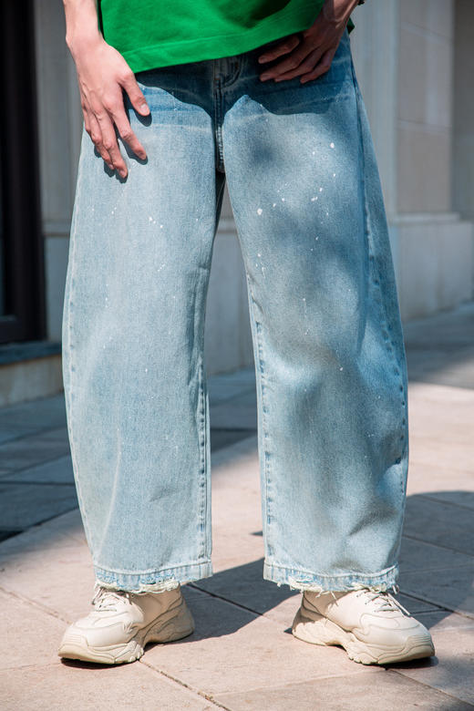 S519131779漆点泼墨弯刀牛仔裤 商品图0