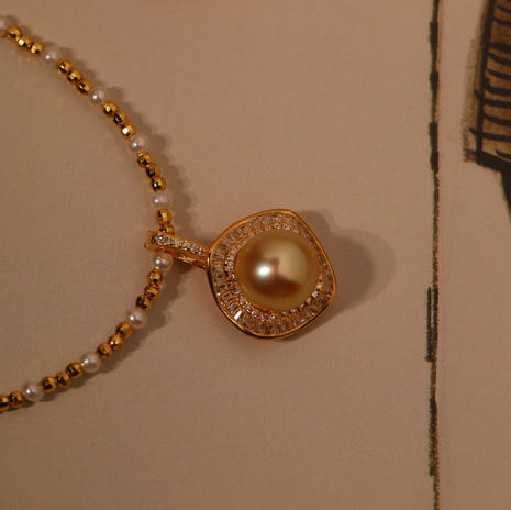 甄珠贝 万能可开合吊坠 南洋金珠 10-11mm 正圆，基本无暇，ji强光 商品图1