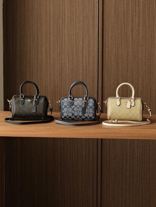 Coach蔻驰女包越南进口材料原厂五金出货RowanPVC新波士顿水桶mini手提斜挎枕头包（SS） 商品图0