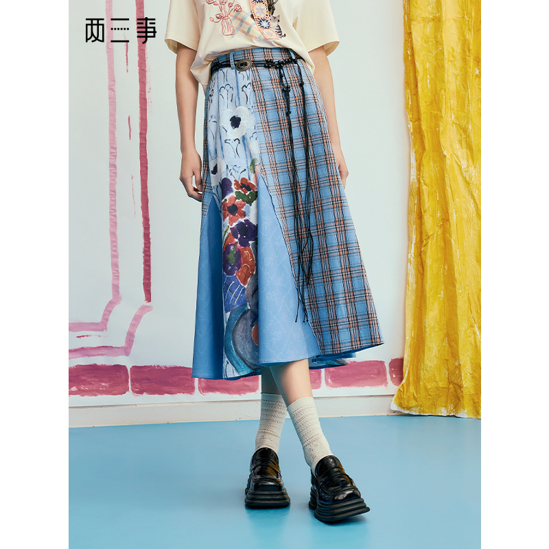 两三事 次元漫游 2025夏季新款波西米亚格子印花裙a字半身裙