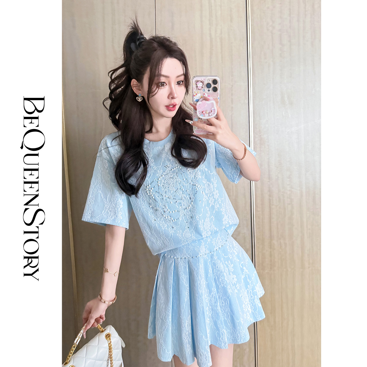 余潇潇【海蓝记忆】精致蕾丝花纹宽松落肩T恤&育克倒褶短裙套装新款