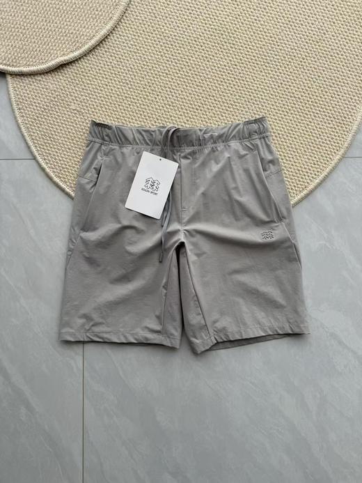 点此购买 可隆夏季男款梭织拼接速干五分短裤 LL 315806 商品图1