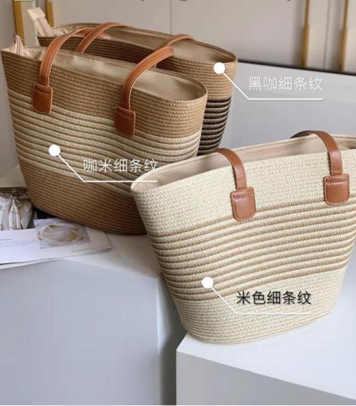 🥰 哈喽，小仙女们~👋 给大家安利一款绝美草编包包！【简约条纹度假风草编包包】👜 🔥这新款夏季通勤单肩托特包，简直就是我夏日出街的最佳拍档！ 商品图1