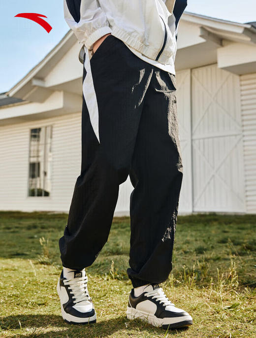 安踏（ANTA）【王一博同款】梭织运动长裤男美式复古休闲裤152438516 基础黑-1 商品图3