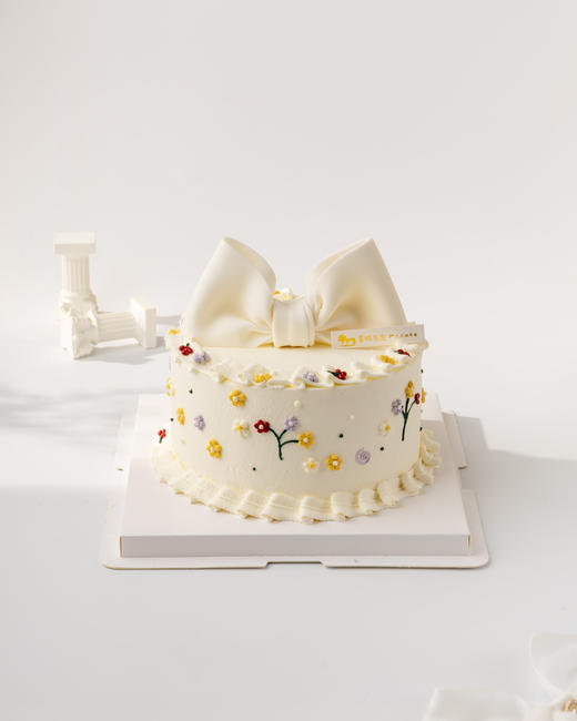 小碎花蝴蝶结蛋糕（百分百进口动物奶油） 商品图0