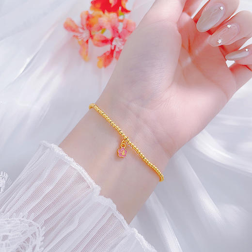 【限时克减150元】足金999 #超轻  #低温珐琅  古法空心圆珠手链福字小金花花形吊饰转运金珠弹力绳手串(AUGFSC000029)（预售产品下单后不退款不退货不换货不补差价） 商品图0