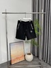 D051266满印老花暗纹提花 logo深色情侣休闲五分裤短裤 商品缩略图1