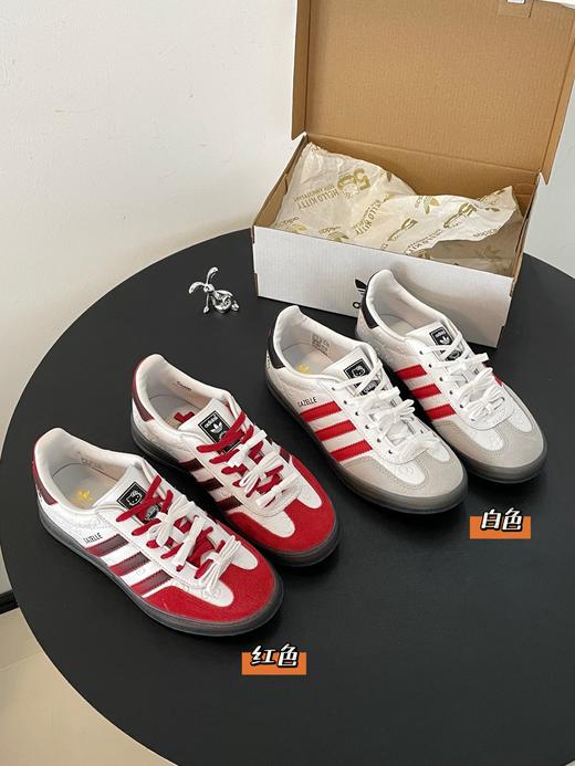 点此购买 Hello Kitty×阿迪50周年限定联名款女士德训鞋 98 318775 商品图0