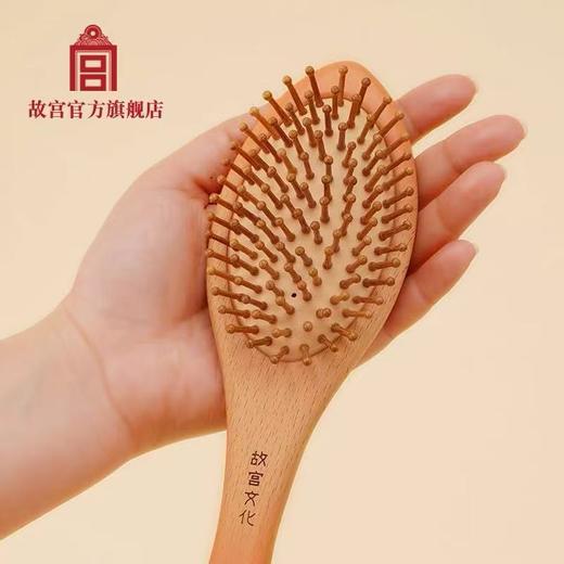 桃花锦鲤按摩梳 商品图1