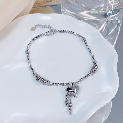 【限时8.8折】【线上铂金馆】PT950 #怦然心动 铂金可调节爱心心形流苏挂饰间珠手链（盘缠实心其余空心）(PTSL00061)预售产品下单后不退款不退货不换货不补差价) 商品图1