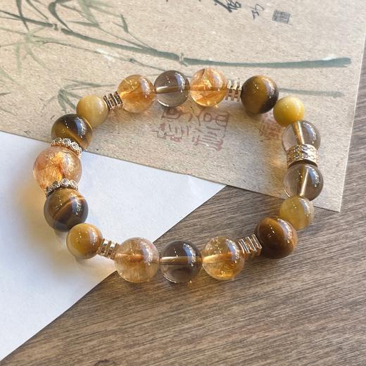 【大金霸】六鑫珠宝 天然黄塔晶虎眼石茶水晶手串 商品图1