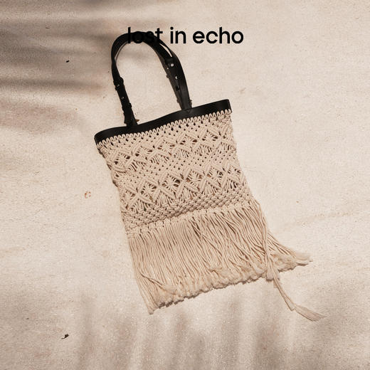 lost in echo2025春夏新款度假风手工编织镂空流苏tote单肩包 商品图0