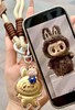 新增Labubu款！带黄金国检证书❗【999足金·Hello Kitty富婆挂件、拉布布挂件】999足金➕一件一证！高清透明外壳+足金厚镀！超值！手机挂饰、车挂、包包挂饰都可~ 商品缩略图2