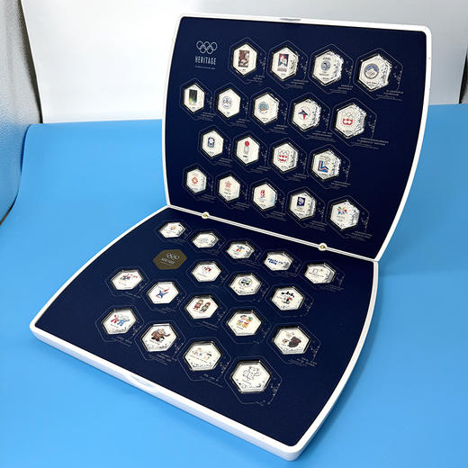 《五环荣耀》历届冬奥会会徽和吉祥物纪念银章  含纯银35克 商品图1