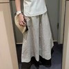 点此购买 北欧小众女士休闲版型松紧腰系带泡泡纱条纹阔腿裤裙裤 xj 322303 商品缩略图4