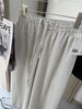 点此购买 北欧小众女士休闲版型松紧腰系带泡泡纱条纹阔腿裤裙裤 xj 322303 商品缩略图9