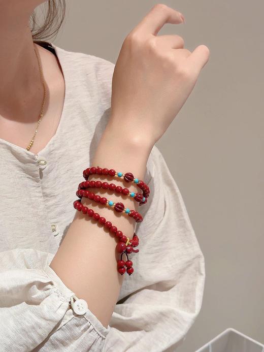 朱砂祈愿【正品可町西岸108颗多圈民族风朱砂手串】送人、自戴都超高级，带鉴定证书!一串一码 多圈缠绕贴合手腕，不会松松垮垮▽穿插的蓝等配饰，和朱砂红形成撞色 商品图1