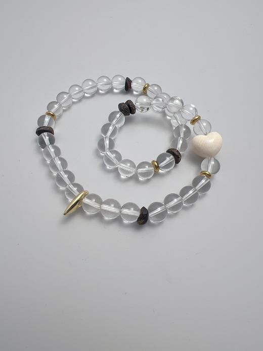 【普陀山】猛犸⽛13-14mm近净体⽩⽔晶奇楠沉⾹手串   净域守护 商品图0