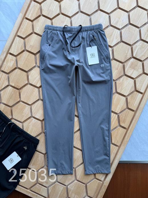 点此购买 可隆夏季男士舒乐修身长裤防泼水透湿弹力户外运动裤 LL 323713 商品图1