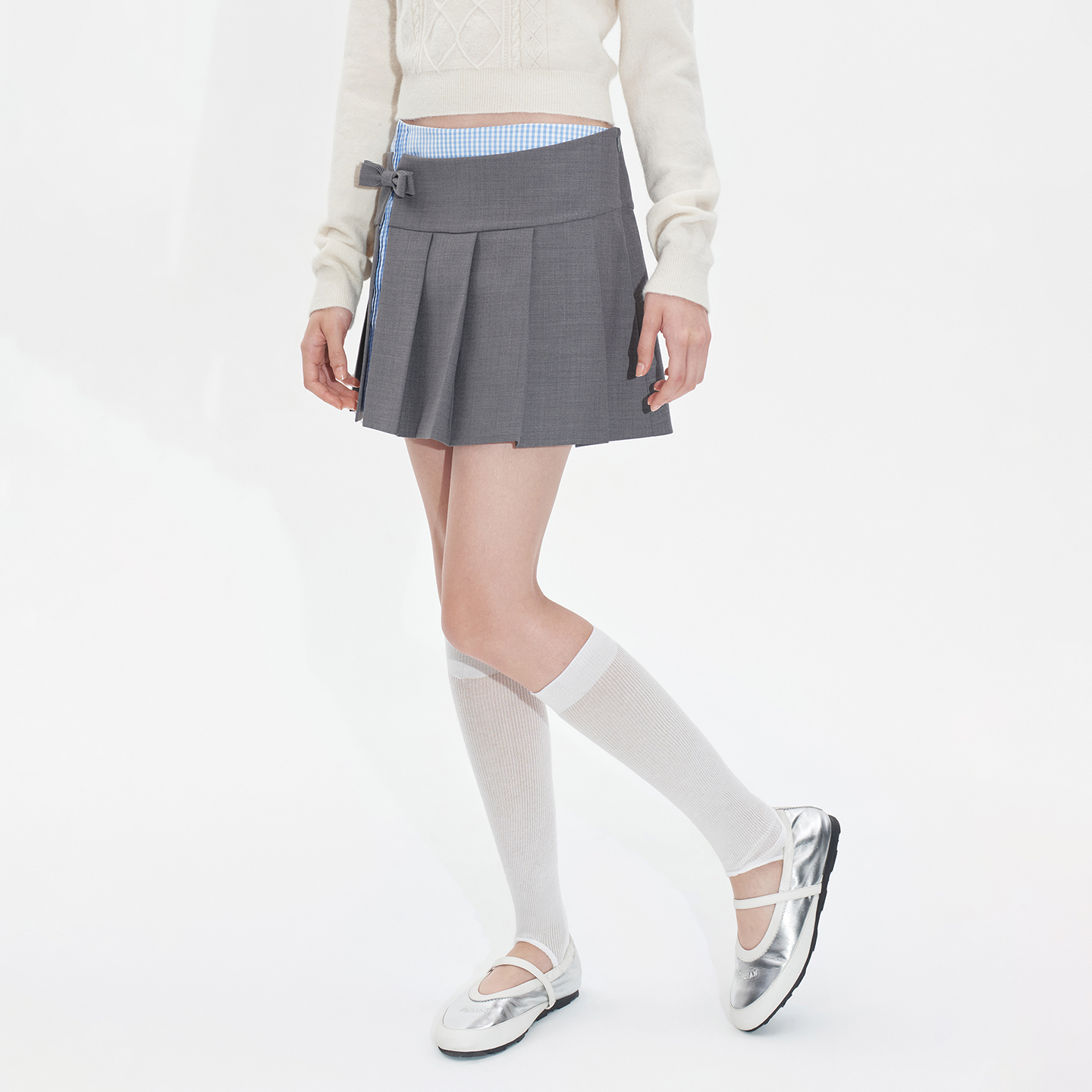 Herlian2025年秋季新品女士假两件格纹拼接不对称设计百褶裙