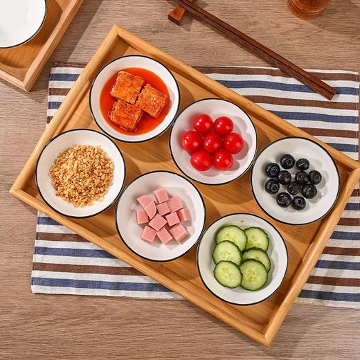 超值秒杀👉9.9💰抢4只【4英寸黑边竖纹陶瓷调味碟】，日式极简风，一秒提升餐桌格调的神器，为家用餐桌增添别样风情 ✅匠心设计， 手工描边黑釉+立体竖纹肌理，光影下质感高级不输千元餐具！ 商品图6