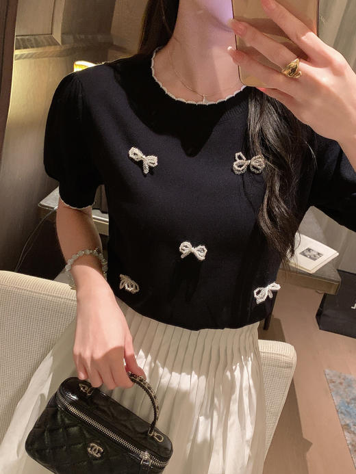 张心子【油画栀子】高腰口袋气质小白裙半身裙 U2507025 商品图7