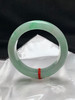 620645，56.7圈口，糯化绿底飘绿正圈平安镯，果绿底飘阳绿色花，条形厚装，水头好 商品缩略图0