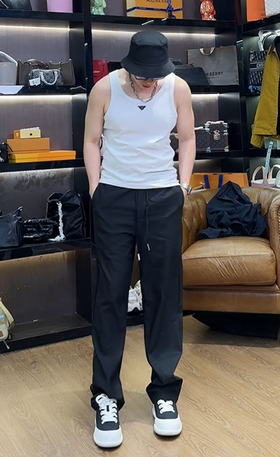 黑色拼接抽绳口袋运动长裤