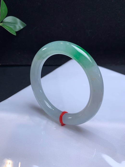 620655，55.3冰飘绿圆条，整体冰冰的，一截绿，条形很好，均匀干净 商品图1