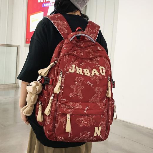 减负书包男生高中生大容量双肩包初中女生印花大学生休闲旅行背泡 商品图1