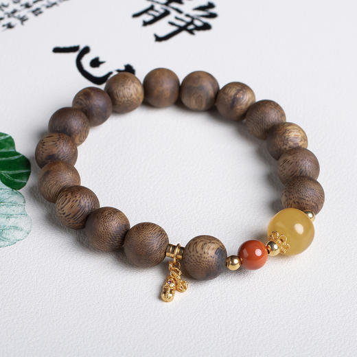 xy0551沉香+蜜蜡南红吉祥手串 商品图1