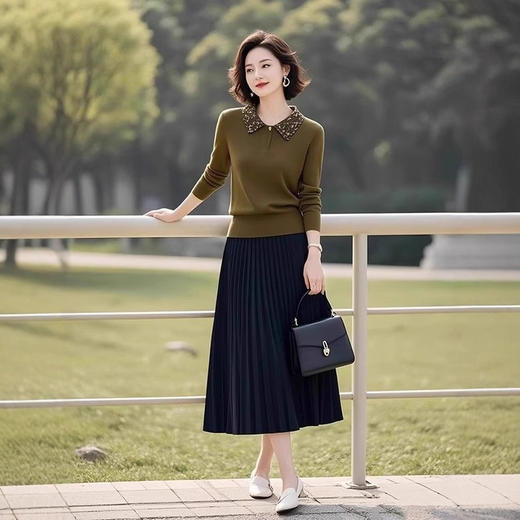 今年流行的针织套装女装2025春季新款polo领上衣百褶半身裙两件套 商品图0
