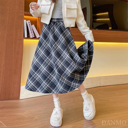 「DANMO格纹A字裙」松紧腰部设计 走线平整彰显质感 清晰纹理质感 呈现出专属视觉效果 A字型设计 有效遮盖腿部缺陷 商品图1