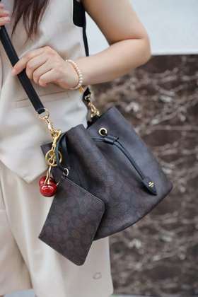 专柜奥莱订单Coa ROWAN发财桶斜挎通勤子母包