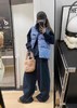 D110713蓝色格纹无袖高领马甲背心棉服男女情侣可穿 商品缩略图2