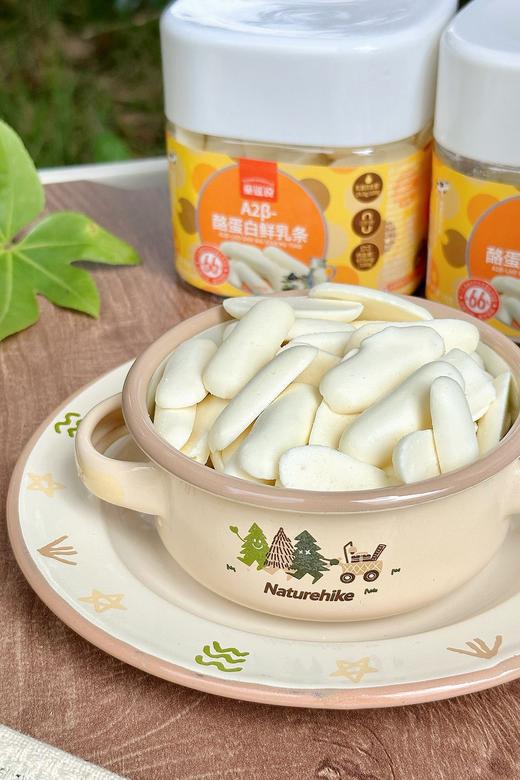 🥛烤着吃的牛奶【童谣说·鲜乳条】 奶香浓郁，酥脆口感，全家都爱的健康担当 🌟2种口味：A2β-酪蛋白鲜乳条＋高钙蓝莓鲜乳条 含量是普通牛奶的6倍左右 商品图2