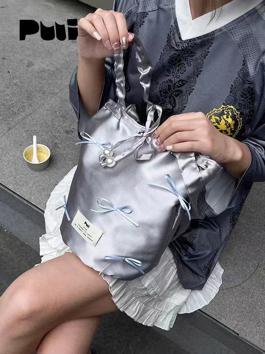 4楼Eubelle欧蓓 puui原创生活单肩包银色手提包 可爱蝴蝶结通勤水桶包ins 活动价：169元 商品图1