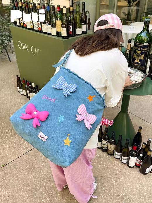 4楼Eubelle欧蓓 puui原创生活大容量牛仔托特包 蝴蝶结单肩包可斜挎 活动价：289元 商品图0