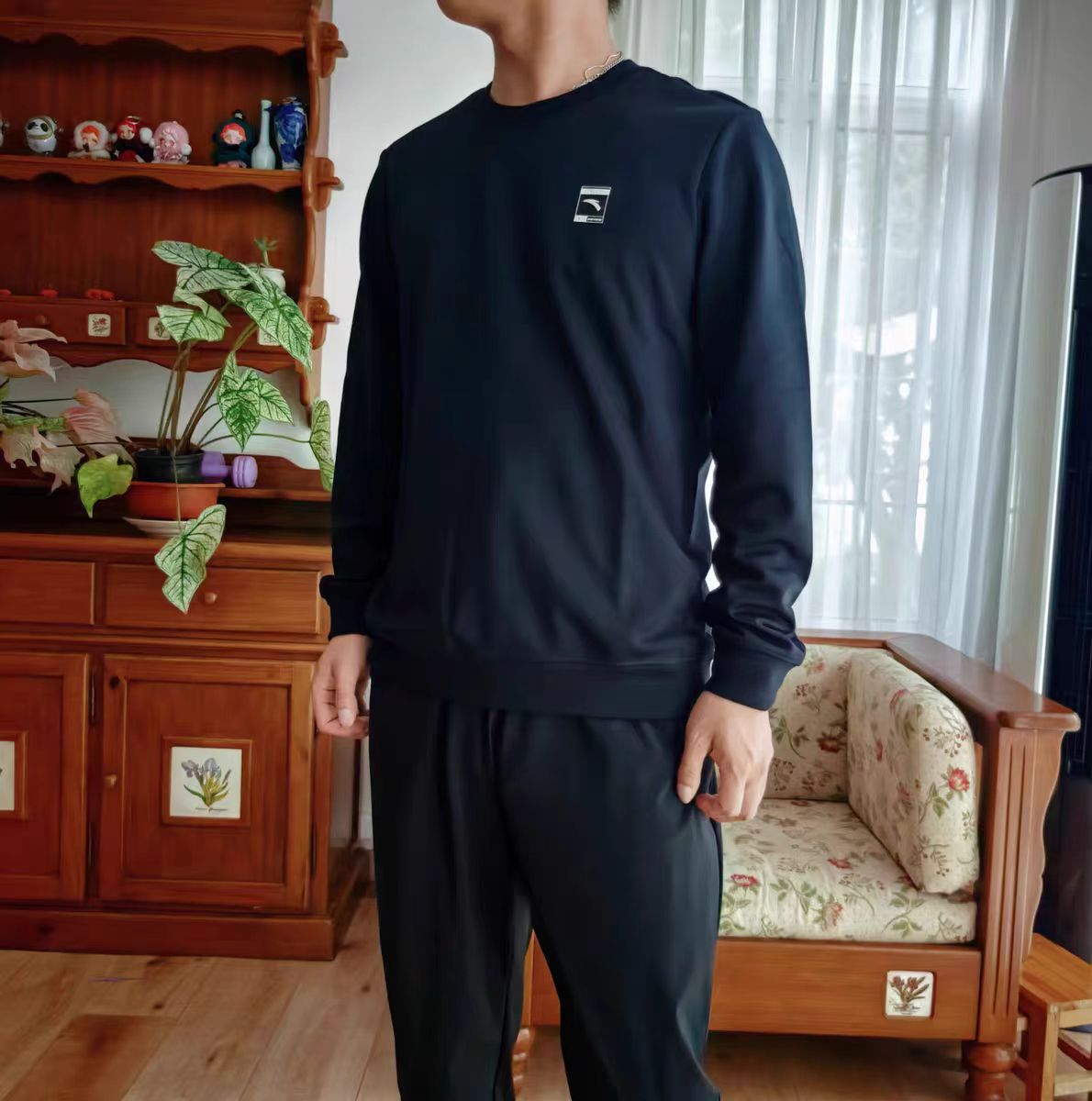 安踏2025新款男圆领长袖T恤套头卫衣舒适圆领打底衫152547707