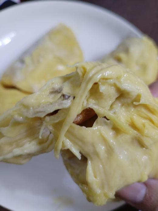 红肉猫山王榴莲肉500g*2袋，核心产区，普遍都是20年树龄的老树果，口感绵密如冰淇淋，薄薄的一层奶油皮，果肉细腻 口感醇香浓厚，彻底化冻几乎没有水！ （因为品种特征 果核偏大），顺丰全国包邮。 商品图6