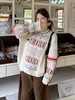 D112539新款几何图案设计感圆领长袖针织衫毛衣女款 商品缩略图4