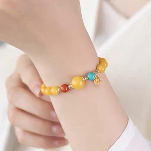 岸纾 吉祥如意天然蜜蜡南红精品手串 商品图3